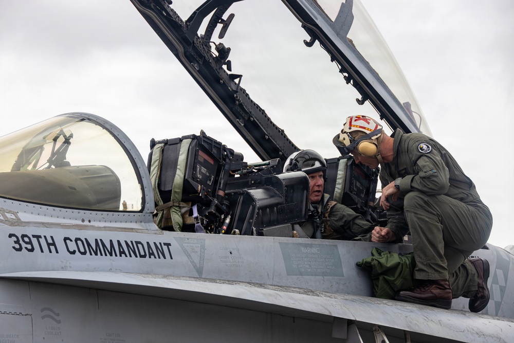 The Commandant, Gen. Eric M. Smith flies a F/A 18 at Marine Fighter Squadron 323