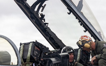The Commandant, Gen. Eric M. Smith flies a F/A 18 at Marine Fighter Squadron 323