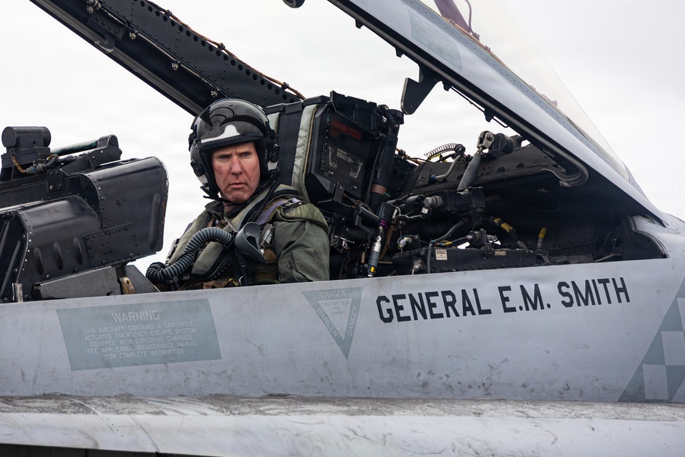 The Commandant, Gen. Eric M. Smith flies a F/A 18 at Marine Fighter Squadron 323