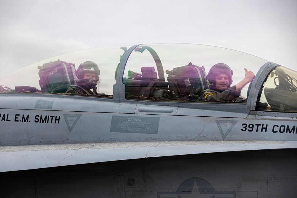 The Commandant, Gen. Eric M. Smith flies a F/A 18 at Marine Fighter Squadron 323