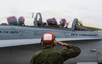 The Commandant, Gen. Eric M. Smith flies a F/A 18 at Marine Fighter Squadron 323