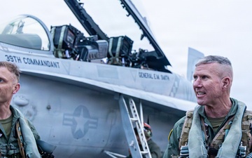 The Commandant, Gen. Eric M. Smith flies a F/A 18 at Marine Fighter Squadron 323