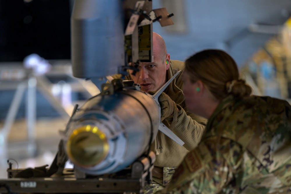 174th Attack Wing Airmen load GBU-38 onto MQ-9 during Sentry South 26-2