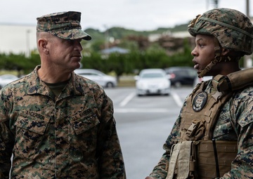 Marines partake in a riot control exercise at Camp Foster