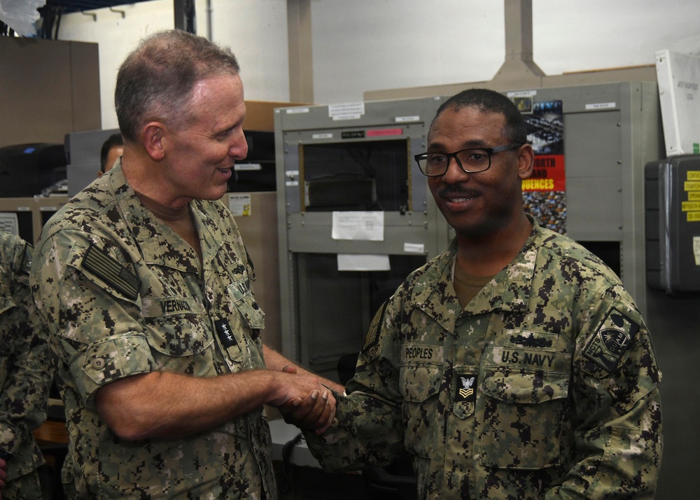 Commander, Naval Information Forces, meets with Information Warfare Sailors stationed in Guam.