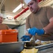 Oyster Shucking practice at Scudder Hall Galley onboard Naval Weapons Station Yorktown