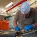 Oyster Shucking practice at Scudder Hall Galley onboard Naval Weapons Station Yorktown