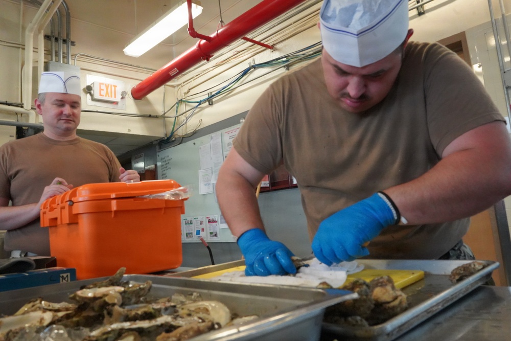Oyster Shucking practice at Scudder Hall Galley onboard Naval Weapons Station Yorktown
