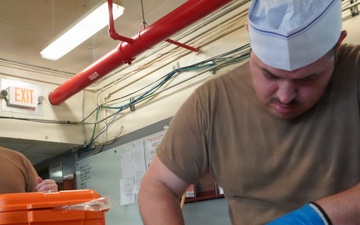 Oyster Shucking practice at Scudder Hall Galley onboard Naval Weapons Station Yorktown