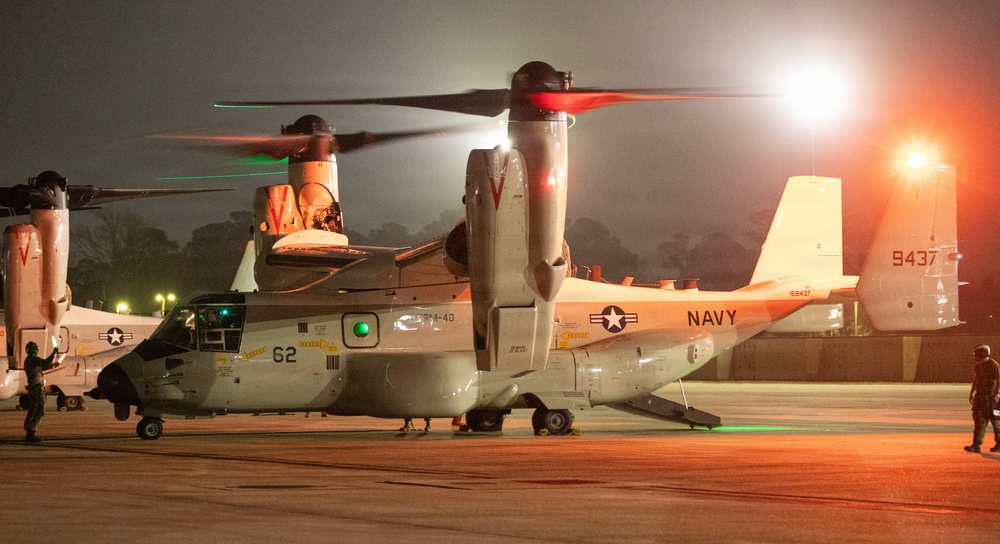 Navy VRM 40 Sailors landing CMV-22B Osprey