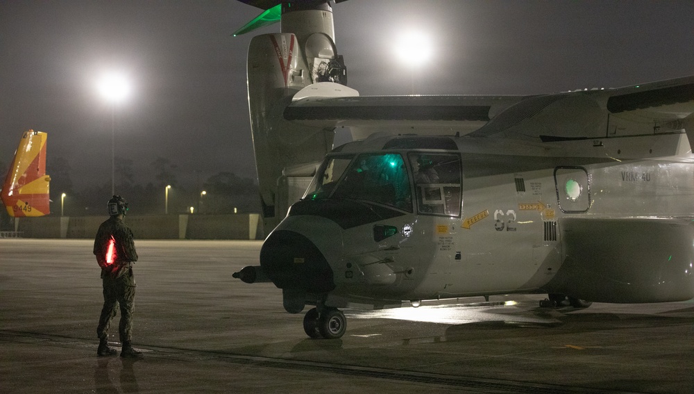 Navy VRM 40 Sailors landing CMV-22B Osprey