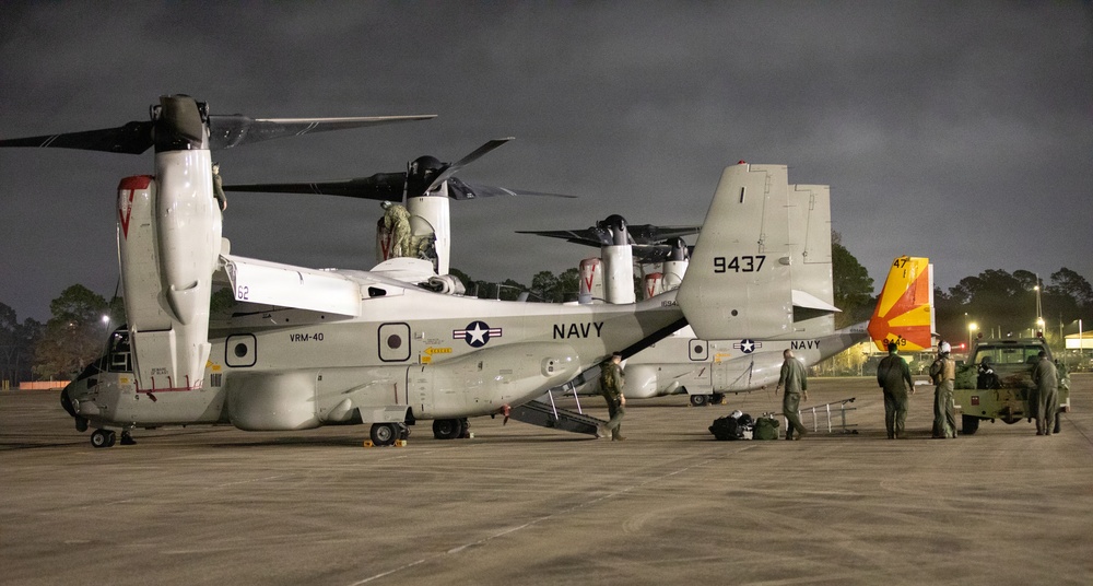 Navy VRM 40 Sailors landing CMV-22B Osprey