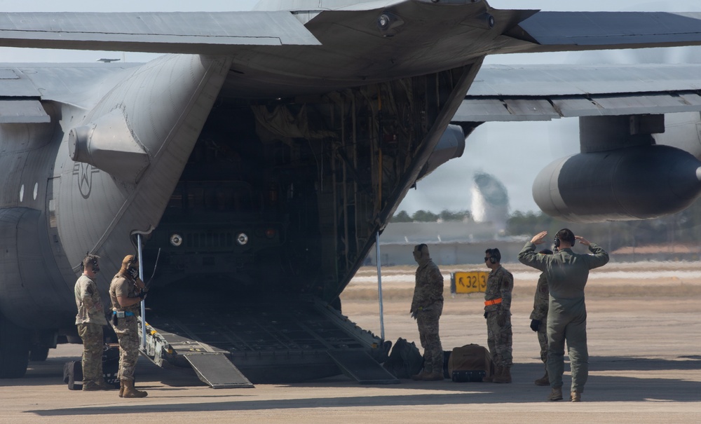 C-130 Dropping Cargo