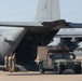 Airmen dropping HUMVEE off C-130