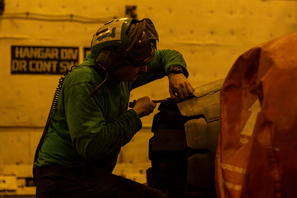 Abraham Lincoln Conducts Routine Aircraft Maintenance