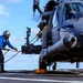 USS Milius (DDG 69) refuels 33rd Rescue Squadron helicopter