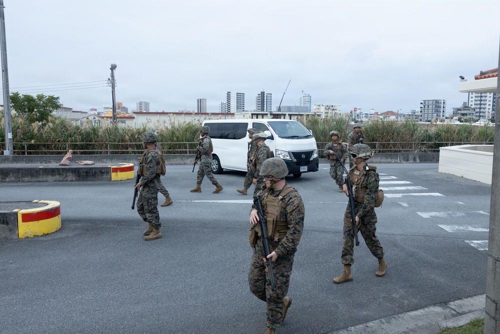Marines respond to a simulated bomb threat during base defense exercise