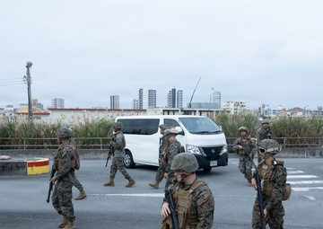 Marines respond to a simulated bomb threat during base defense exercise