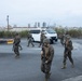 Marines respond to a simulated bomb threat during base defense exercise