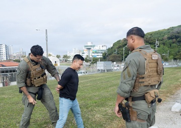 Marines respond to a simulated bomb threat during base defense exercise