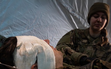 U.S. Army Soldier is Treated by Pfc. Maggie West During a Casualty in a Mass Casualty Training Event During Combined Resolve 26-05