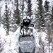 Green Beret operates snowmobile through Alaskan wilderness