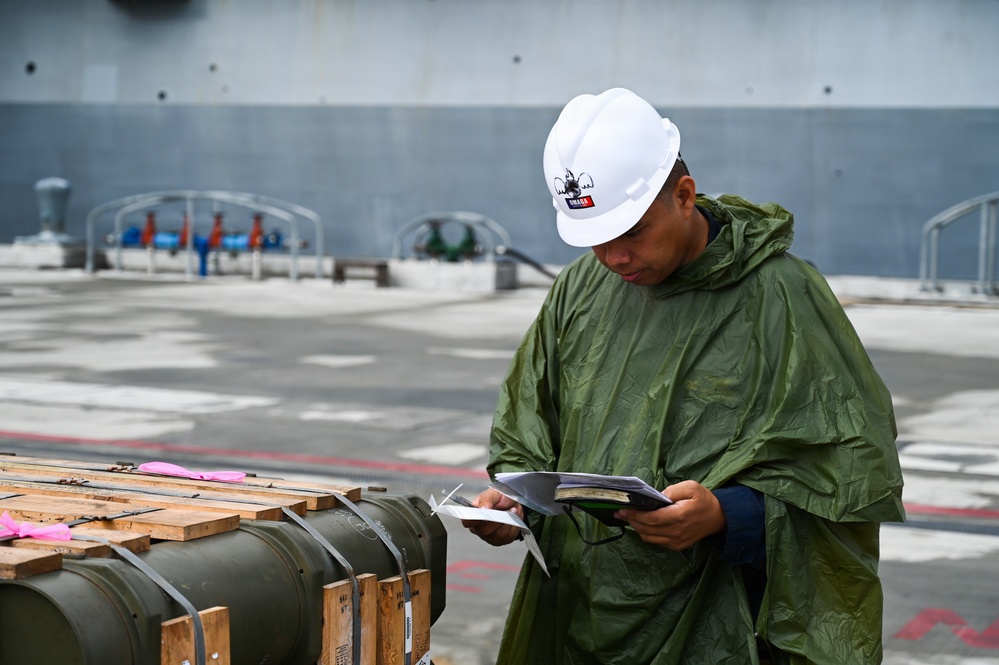 USS Anchorage conducts ammunition on-load