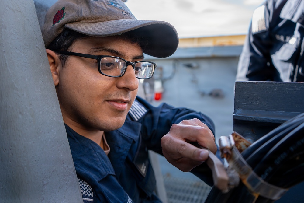 U.S. Navy Sailors Conduct Maintenance