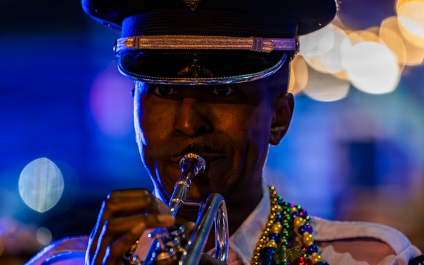 Band of the West and Fort Sam's Own march in Mardi Gras