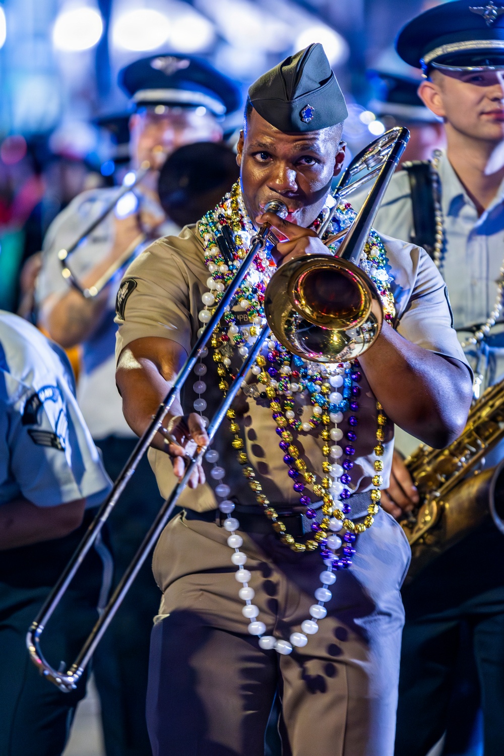 Band of the West and Fort Sam's Own march in Mardi Gras