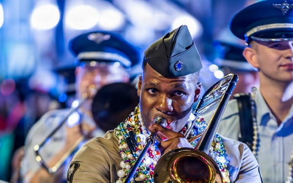 Band of the West and Fort Sam's Own march in Mardi Gras