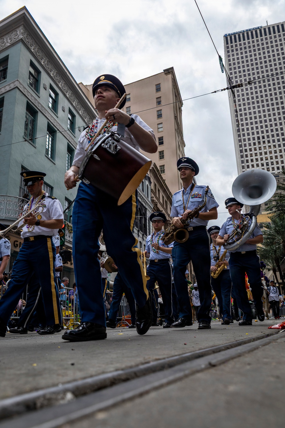 Band of the West and Fort Sam's Own march in Mardi Gras