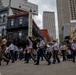 Band of the West and Fort Sam's Own march in Mardi Gras
