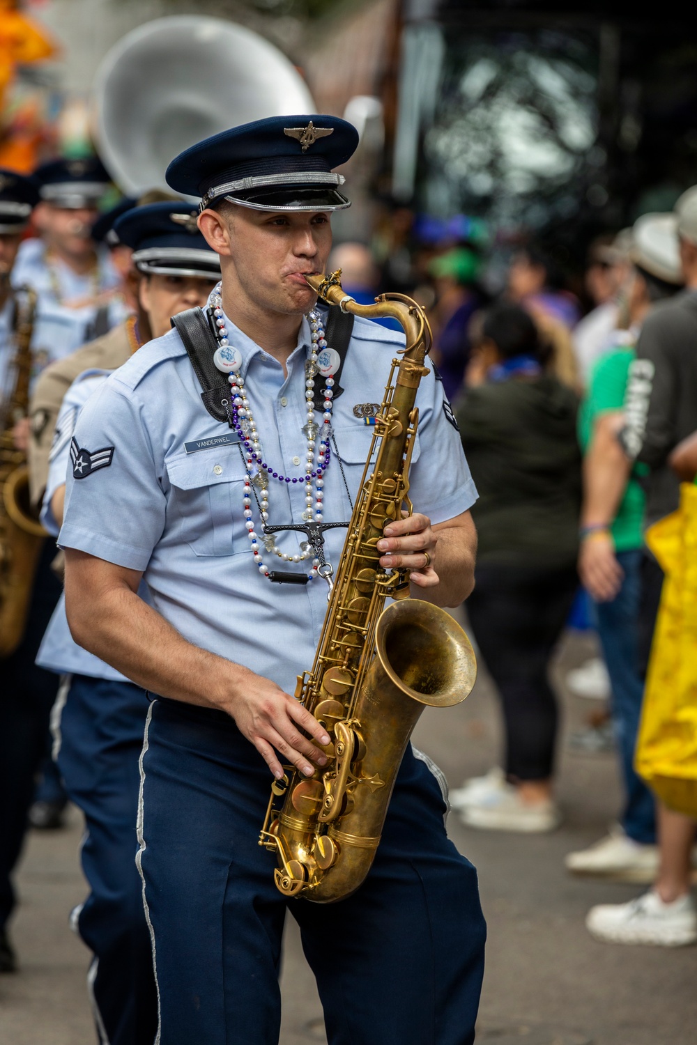 Band of the West and Fort Sam's Own march in Mardi Gras