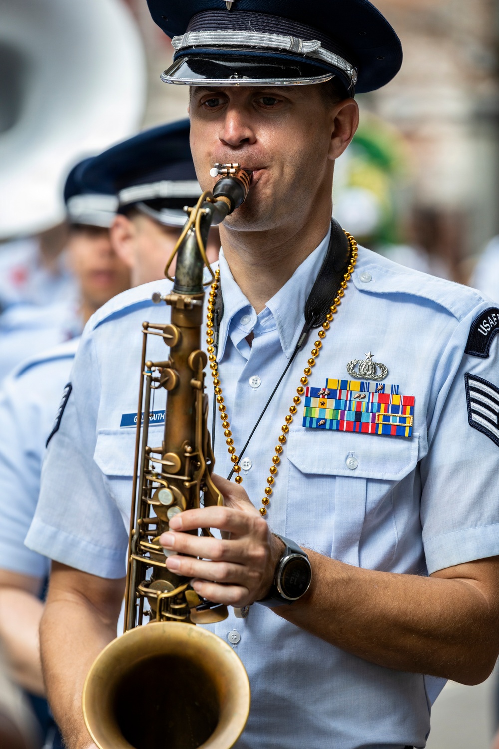 Band of the West and Fort Sam's Own march in Mardi Gras