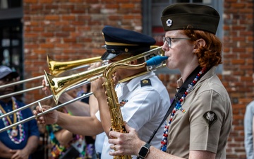 Band of the West and Fort Sam's Own march in Mardi Gras