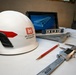 USACE Hard Hat and Engineering Tools on Drafting Table