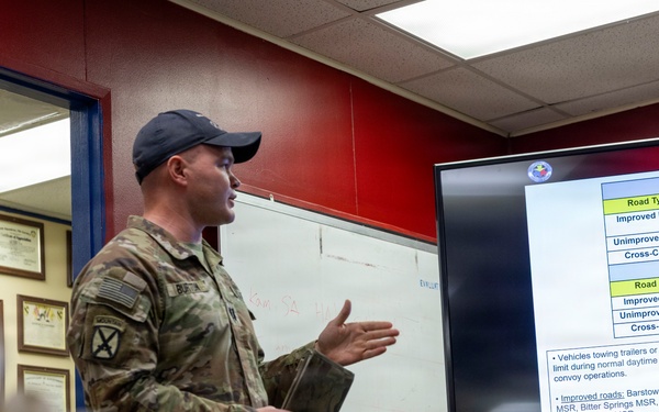 U.S. Marines with 3rd LAR receive NTC 26-03 brief from 3rd Calvary Regiment