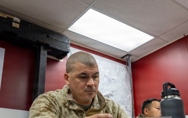 U.S. Marines with 3rd LAR receive NTC 26-03 brief from 3rd Calvary Regiment