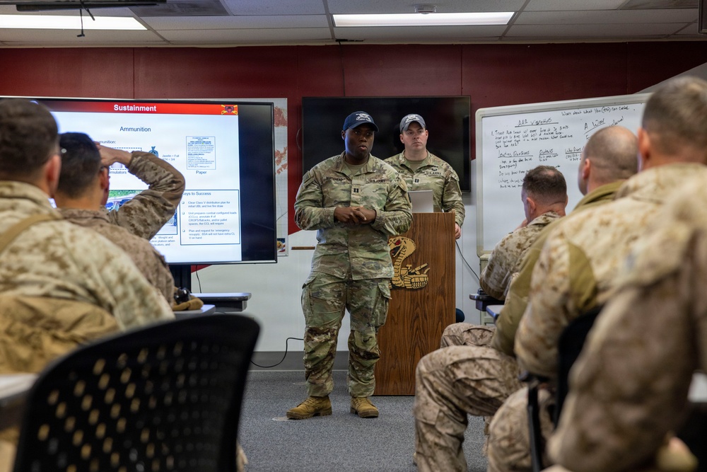 U.S. Marines with 3rd LAR receive NTC 26-03 brief from 3rd Calvary Regiment