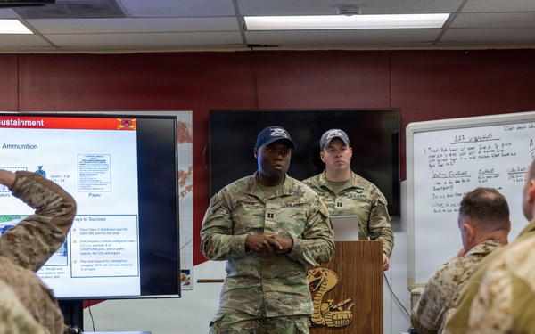 U.S. Marines with 3rd LAR receive NTC 26-03 brief from 3rd Calvary Regiment