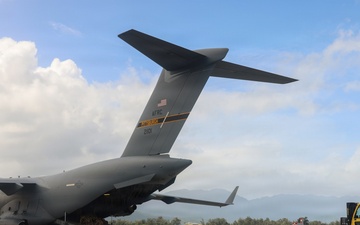 3rd MLR Marines off-load equipment from C-17 Globemaster III