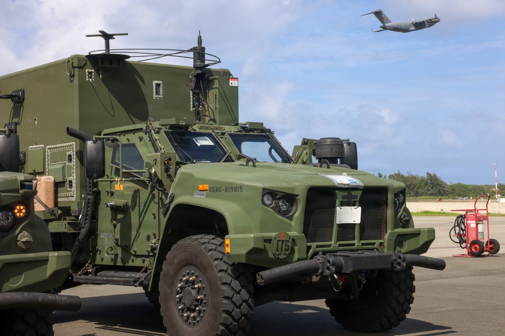 3rd MLR Marines off-load equipment from C-17 Globemaster III
