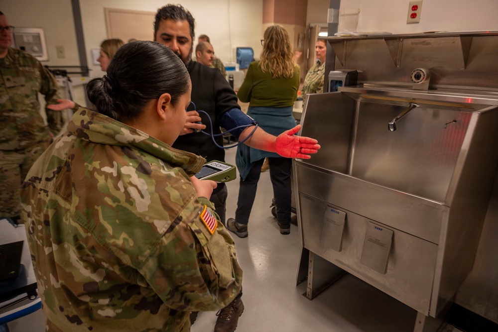 Medical experimentation teams, medics, corpsmen support ARCTIC EDGE 2026 at USCG Air Station Kodiak