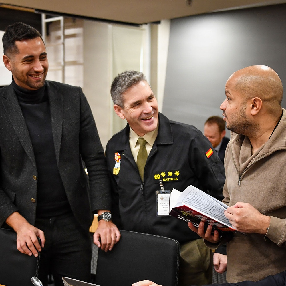 Participants engage in conversations during the Strategic Competition in Russia course