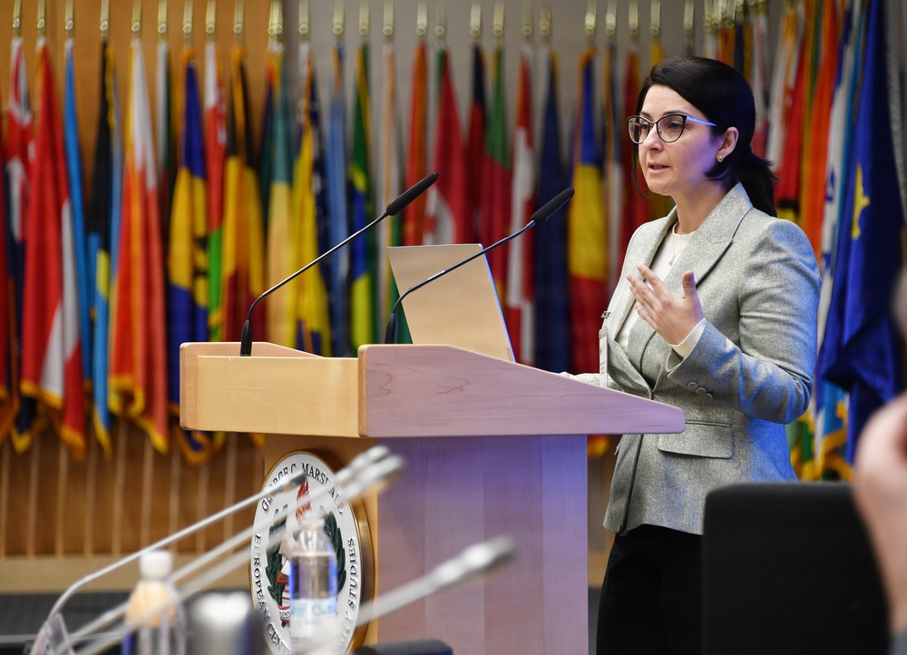 Mainela Petkova speaks to participants during the Strategic Competition in Russia course