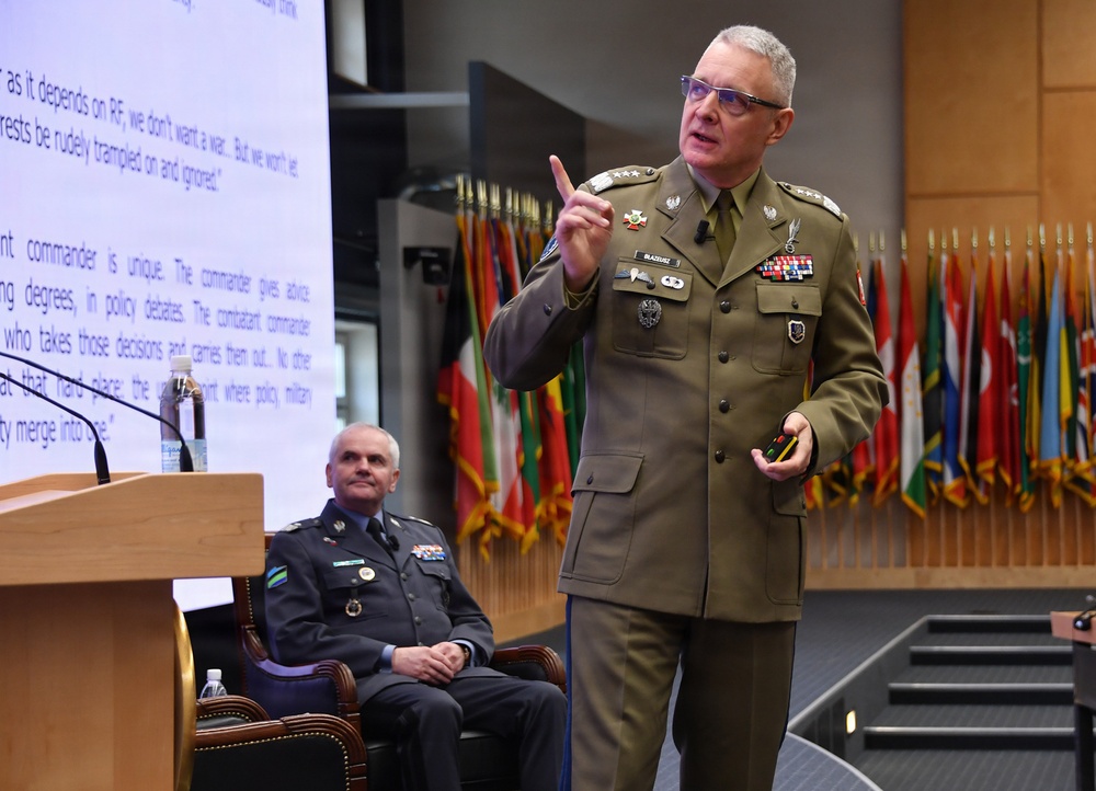 Polish Lt. Gen. Piotr Błazeusz speaks to participants during the Strategic Competition in Russia course