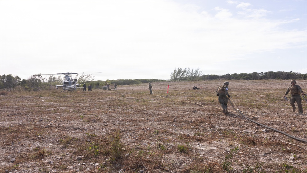 U.S. Marines with MWSS-271 refuel AH-1Z vipers with HMLA-269
