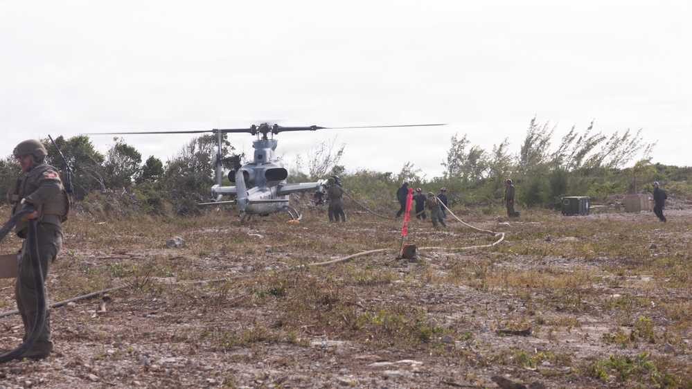 U.S. Marines with MWSS-271 refuel AH-1Z vipers with HMLA-269