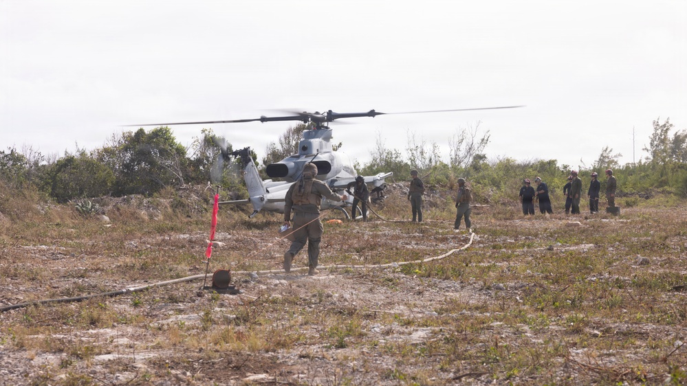 U.S. Marines with MWSS-271 refuel AH-1Z vipers with HMLA-269
